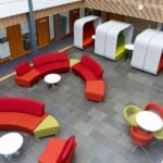 modern reception aerial with rend and apple green furniture